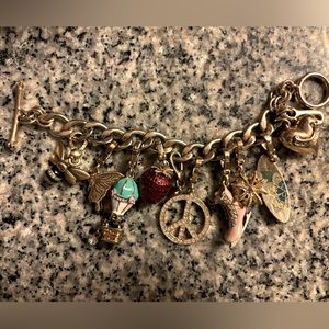 Beautiful juicy couture bracelet with 9 charms